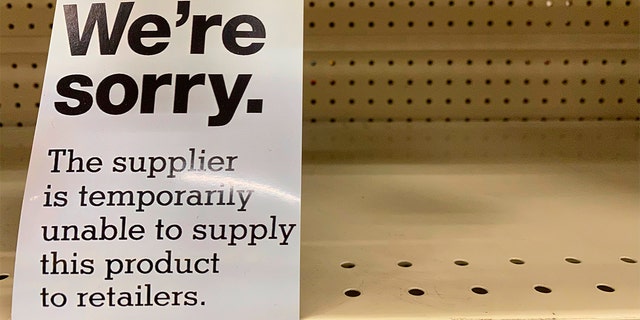 A sign is seen on the shelf at a CVS store in Queens, New York.