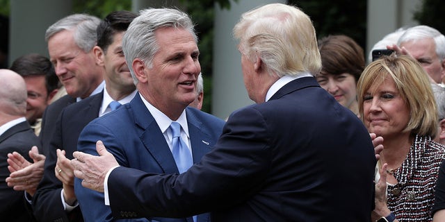 WASHINGTON, DC - MAY 04:  U.S. President Donald Trump (R) greets House Majority Leader Rep. Kevin McCarthy (R-CA) (L) during a Rose Garden event May 4, 2017 at the White House in Washington, DC. The House has passed the American Health Care Act that will replace the Obama era's Affordable Healthcare Act with a vote of 217-213.  (Photo by Alex Wong/Getty Images)