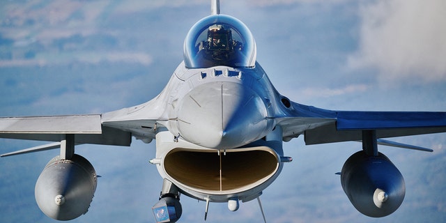 A F16 fighter jet takes part in the NATO Air Shielding exercise near the air base in Lask, central Poland on October 12, 2022. 