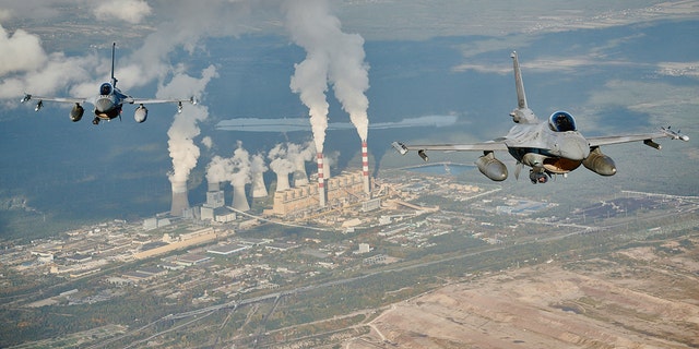 F16 fighter jets takes part in the NATO Air Shielding exercise near the air base in Lask, central Poland on October 12, 2022. 