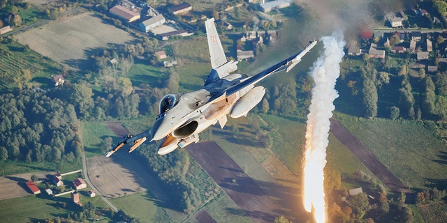 A F16 fighter jet takes part in the NATO Air Shielding exercise near the air base in Lask, central Poland on October 12, 2022. 