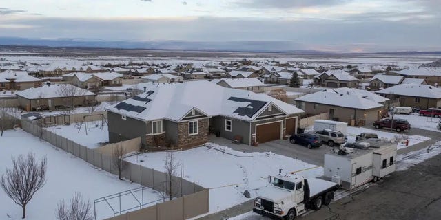 A home where eight people were found dead in Enoch, Utah, is pictured on Thursday, Jan. 5, 2023. The southern Utah community was struggling for answers after police found eight people from one family, including five children, shot to death in the small town. 