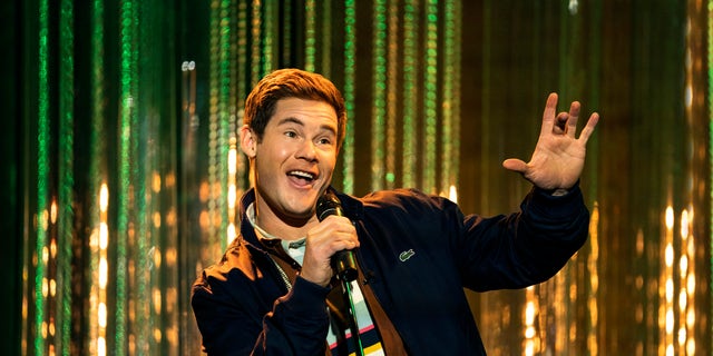 Adam DeVine acting during a performance. 