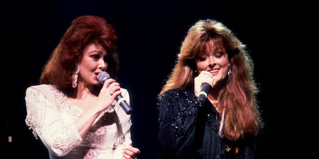 The Judds (pictured in 1991,) with Naomi Judd (left) and daughter Wynonna, earned 14 No. 1 singles and five Grammy Awards in the '80s and early '90s. 