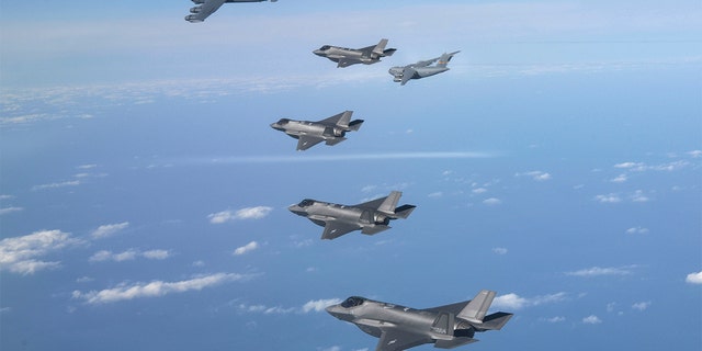 A U.S. B-52 bomber, C-17 and South Korean Air Force F-35 fighter jets fly over the Korean Peninsula during a joint air drill in South Korea, Dec. 20, 2022.