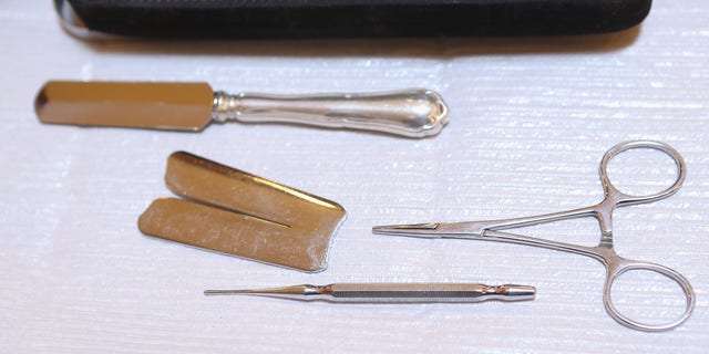 Instruments used in the Jewish circumcision ceremony lie on a table prior to the circumcision of baby infant Mendl Teichtal at the Chabad Lubawitsch Orthodox Jewish synagogue on March 3, 2013 in Berlin. Germany's parliament, the Bundestag, passed a law affirming the legality of circumcision in December after a Cologne court called the practice into question in May 2012, a ruling that sparked outrage among Germany's Jewish and Muslim population.