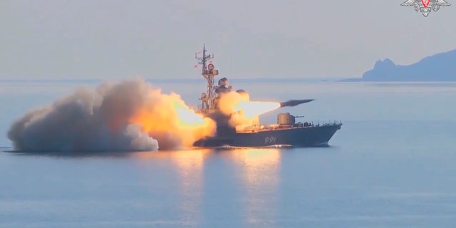 In this photo made from video provided by the Russian Defense Ministry Press Service on Tuesday, March 28, 2023, a Russian navy boat launches an anti-ship missile test in the Peter The Great Gulf in the Sea of Japan. 