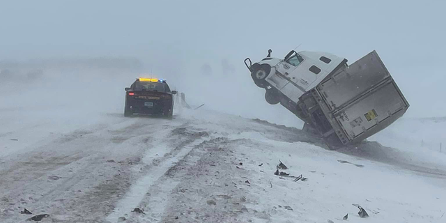 Truck crash snow South Dakota