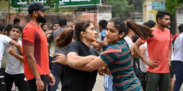 Indian wrestlers Vinesh Phogat,