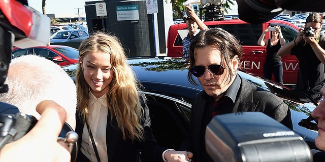 Johnny Depp Amber Heard arrive at Southport Magistrates Court in April 2016