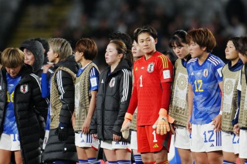 Japan players react following the team's 2-1 defeat against Sweden. 