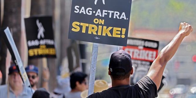 SAG-AFTRA strike sign held by protestor