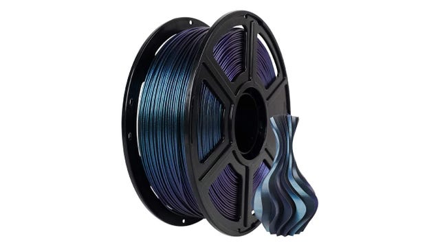 Roll of purple ish plastic filament