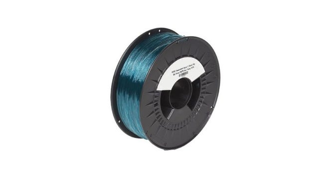 A roll of greenish blue filament