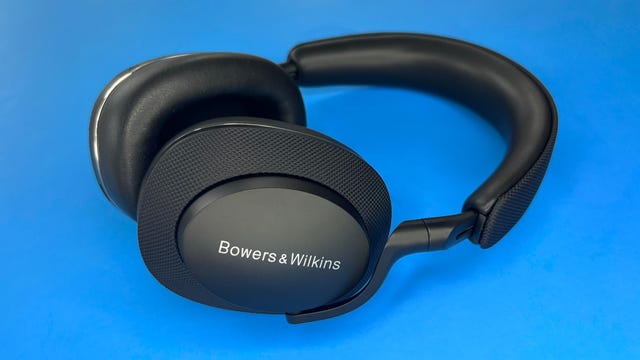 Bowers & Wilkins PX7 S2 headphones on a blue background