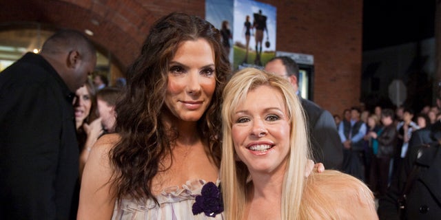 Sandra Bullock poses with Leigh Anne Tuohy