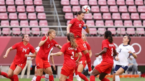 KASHIMA, JAPAN - AUGUST 02: Christine Sinclair #12 of Team Canada wins a header during the Women's Semi-Final match between USA and Canada on day ten of the Tokyo Olympic Games at Kashima Stadium on August 02, 2021 in Kashima, Ibaraki, Japan. (Photo by Atsushi Tomura/Getty Images)