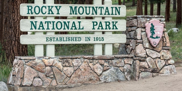 A sign for Colorado's Rocky Mountain National Park