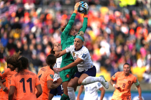 Dutch goalkeeper Daphne van Domselaar grabs the ball over the United States' Julie Ertz during their 1-1 draw on July 27.