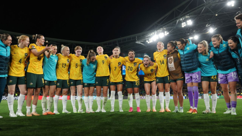 Captain Sam Kerr of Australia speaks to her teammates after her team's 2-0 victory over Denmark at Stadium Australia on August 7.