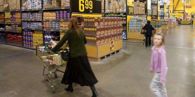 shoppers in warehouse store