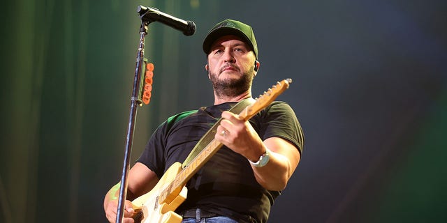 A photo of Luke Bryan performing