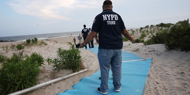 NYPD at Rockaway Beach after rare shark attack