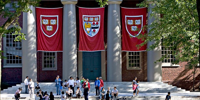 Harvard banners outside campus building