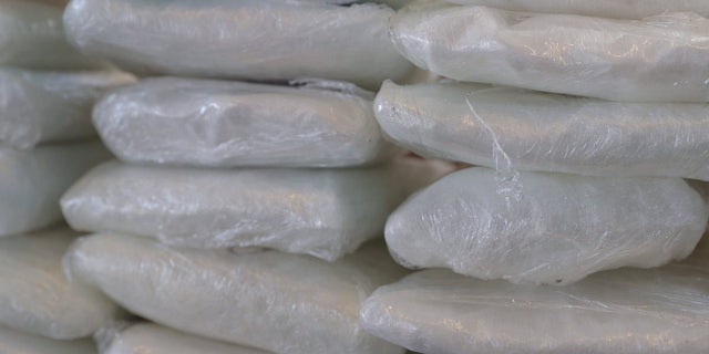 Fentanyl in bags stacked up on a table