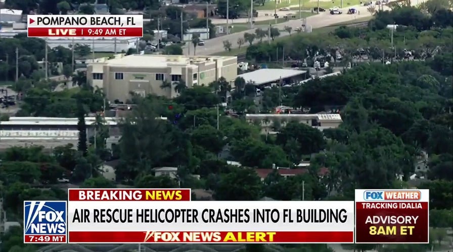 Air rescue helicopter crashes into Florida building, at least 3 injured