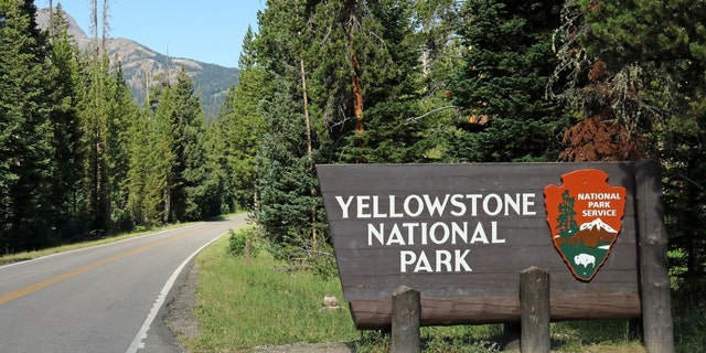 An entrance sign for Yellowstone National Park