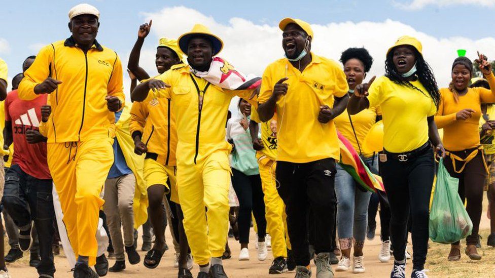 Citizens Coaltion for Change (CCC) party supporters protest in front of police after their party rally to be addressed by leader Nelson Chamisa