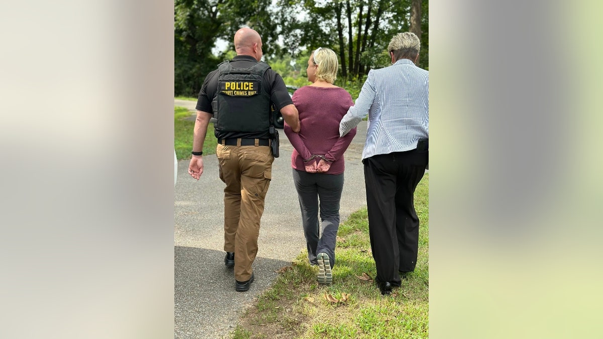 Alissa McCommon in handcuffs