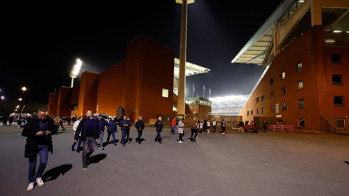 People near the soccer stadium