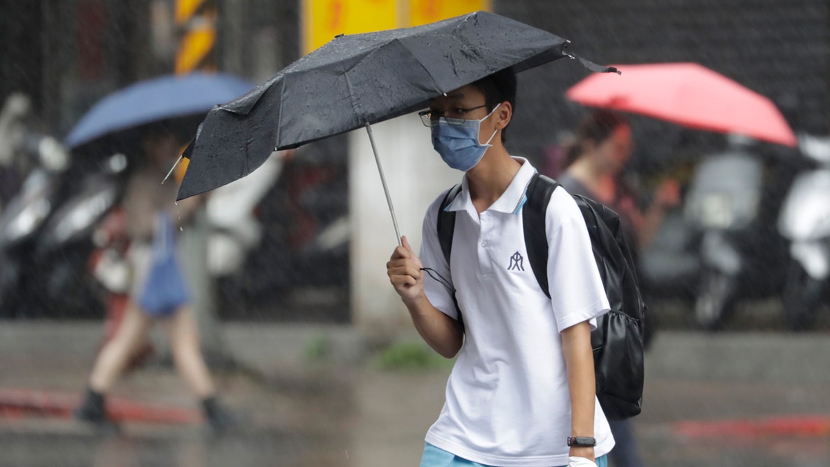 People in the rain