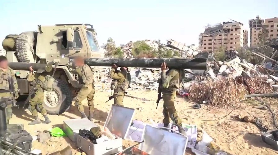 Israel’s military reveals massive Gaza Strip weapons depot its troops discovered 