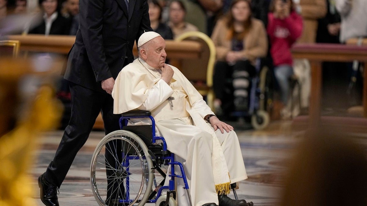 Pope Francis in a wheelchair