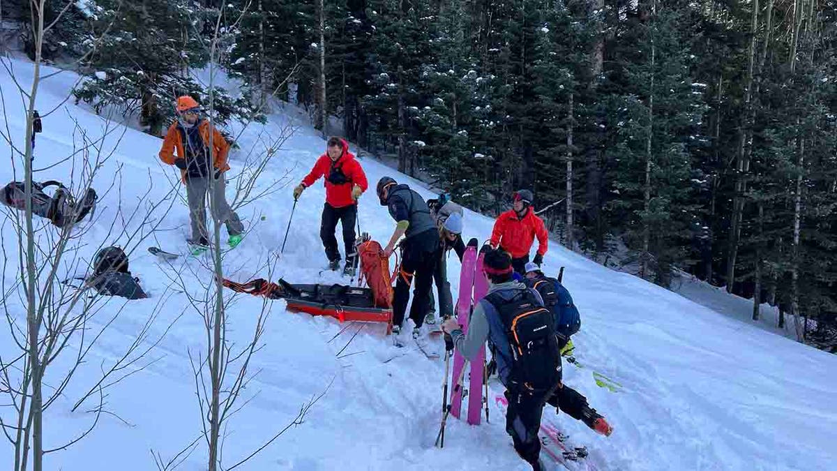 rescuers on slope