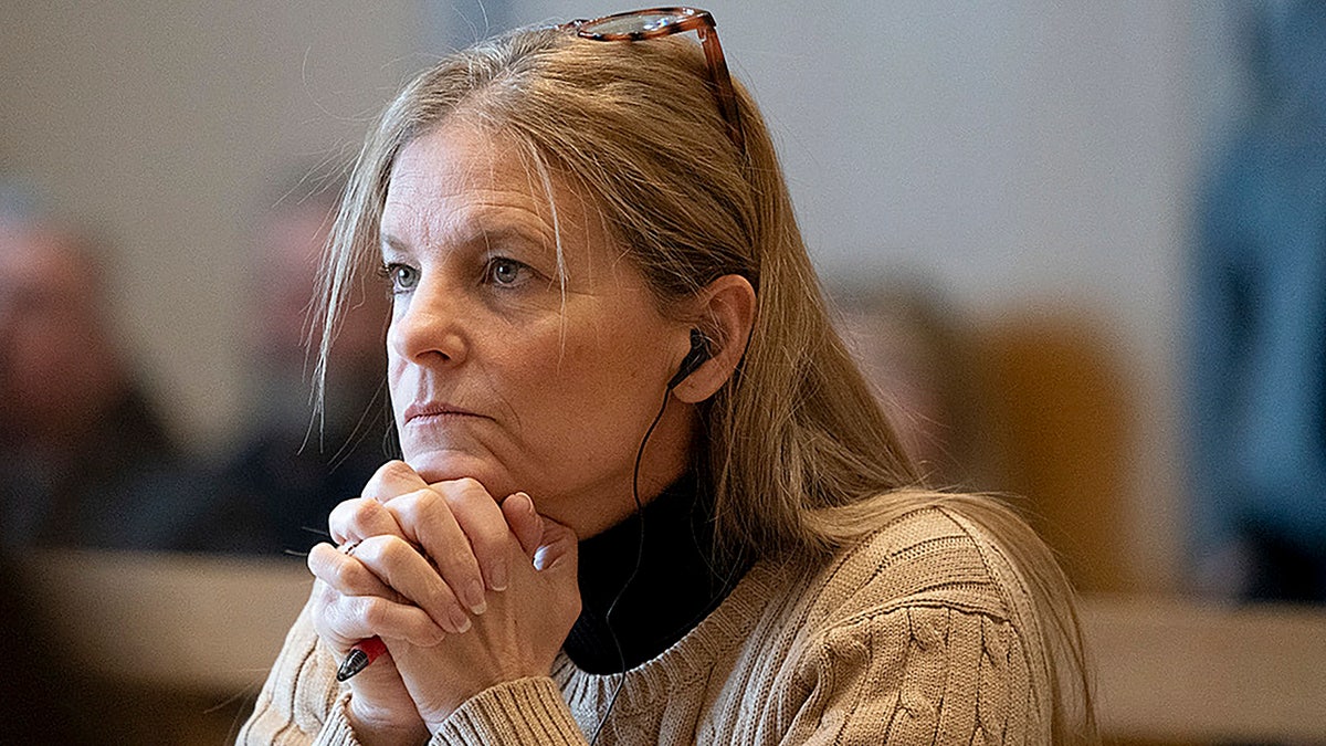 Michelle Troconis listens to arguments at the start of her trial