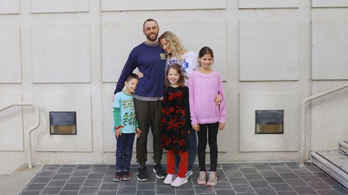 Imahes of Lt. Ridge Alkonis with his family