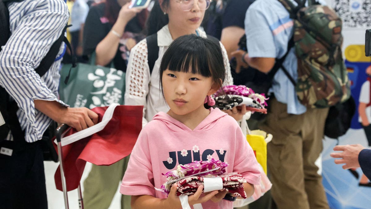 Chinese tourists arrive at Bangkok airport