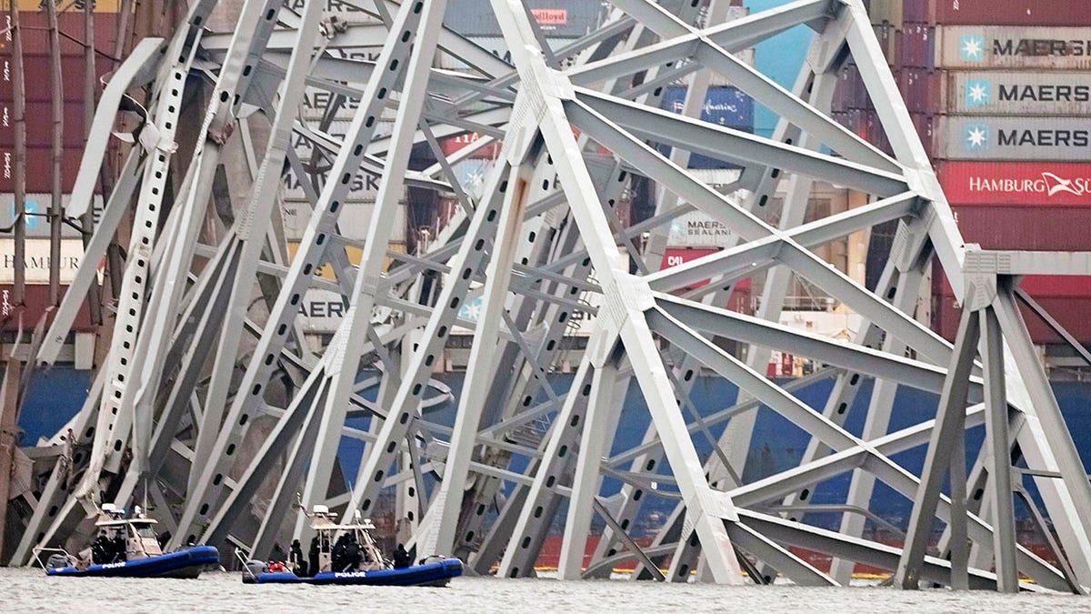 Police boats search Baltimore bridge area