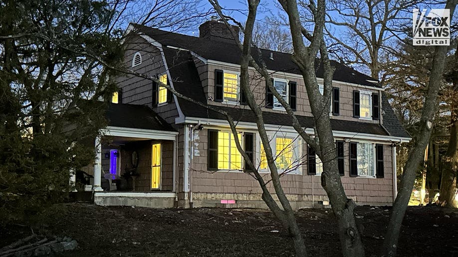 An exterior view of the front entrance of Joseph and Susana Landa’s home where squatter Brett Flores has taken over.