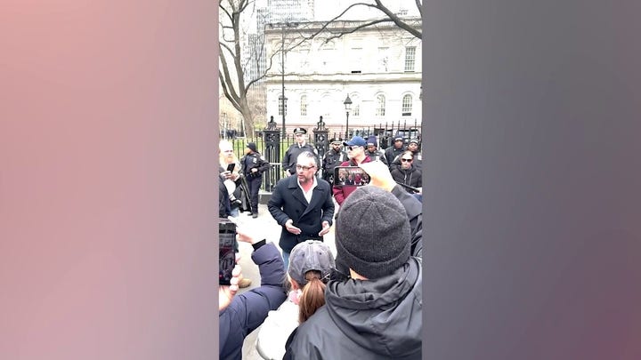 Conservative artist Scott LoBaido speaking before he was collared for tossing pizza onto New York City Hall grounds in response to the coal-fired oven crackdown.