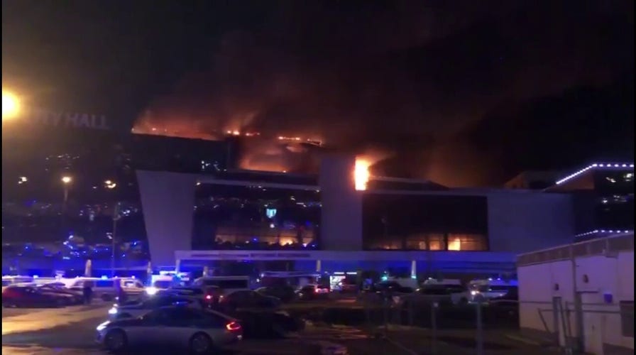 Russia concert hall goes up in flames after attack investigated as terrorism