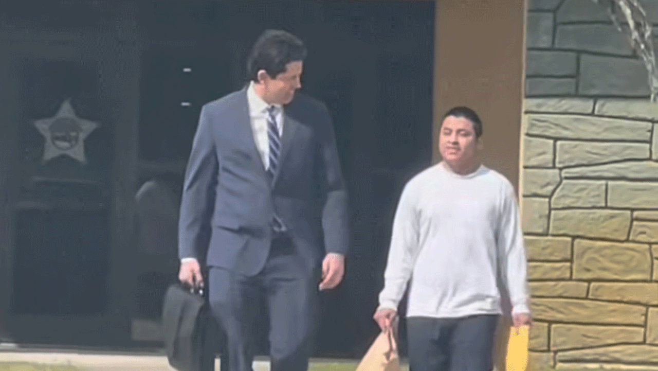 Virgilio Aguilar Mendez, and his attorney walking