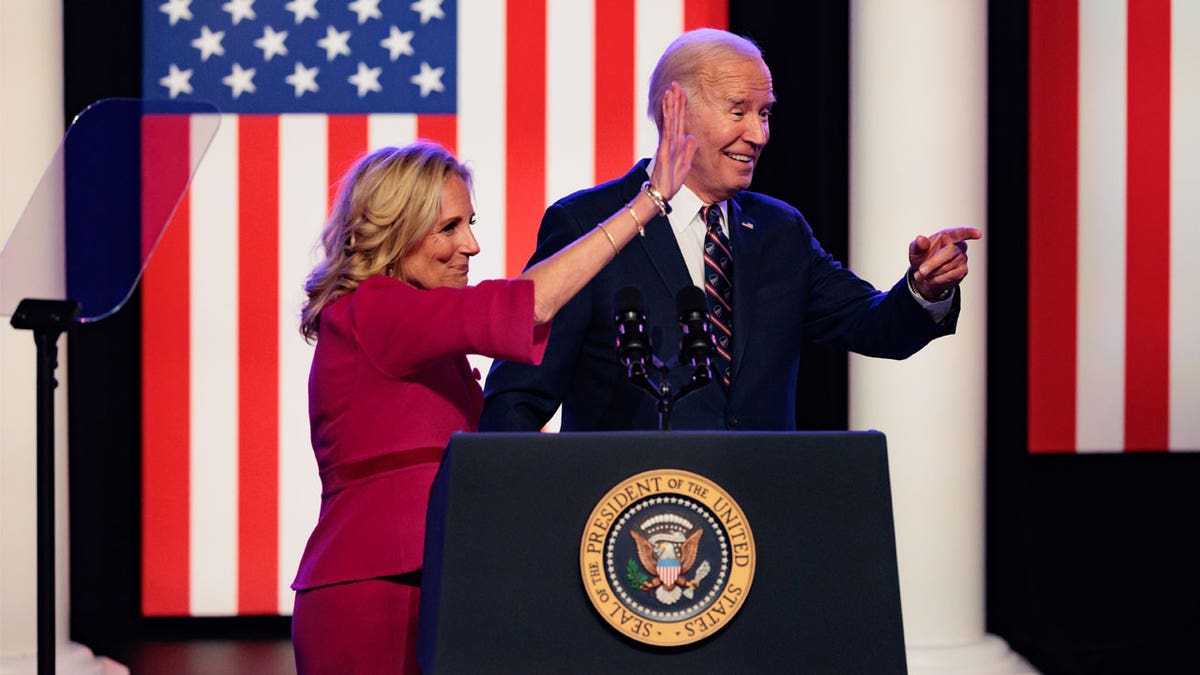 Bidens waving