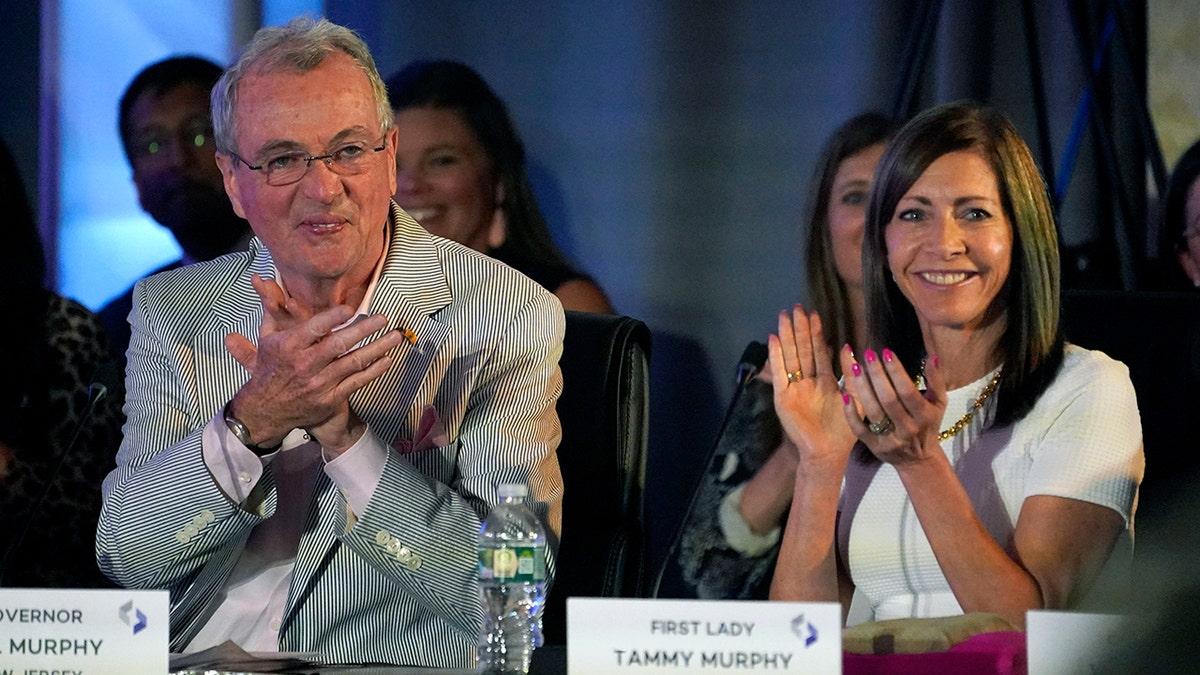 New Jersey governor and his wife who was running for Senate