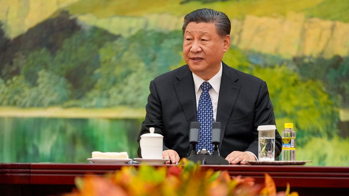 Chinese President Xi Jinping talks to U.S. Secretary of State Antony Blinken at the Great Hall of the People in Beijing, China.