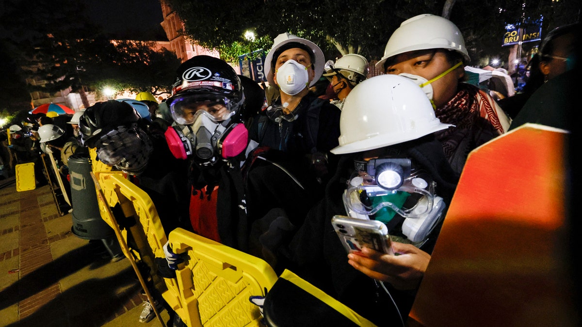 Protesters wearing face masks